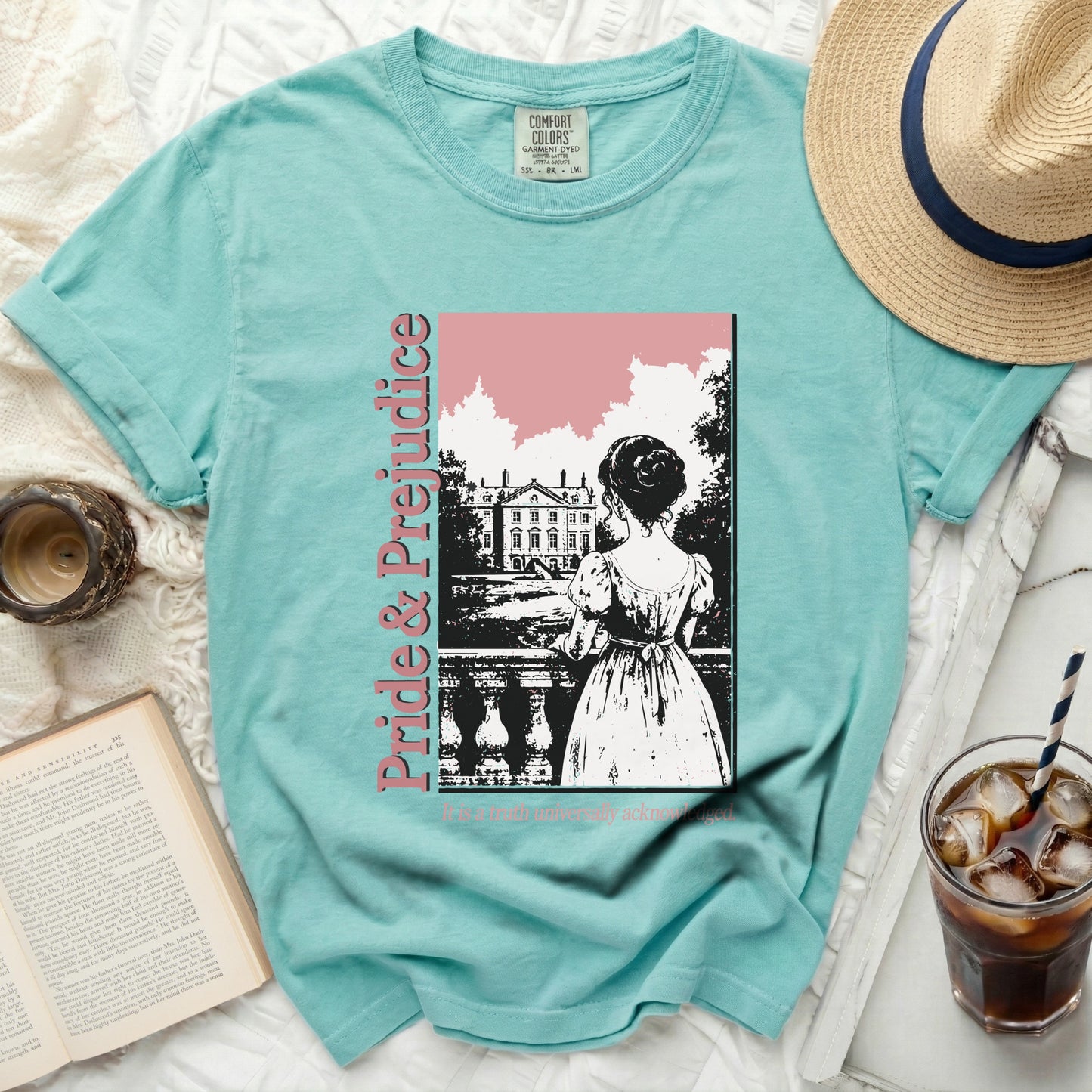 Teal Comfort Colors shirt with "Pride & Prejudice" graphic of a woman looking at a mansion.