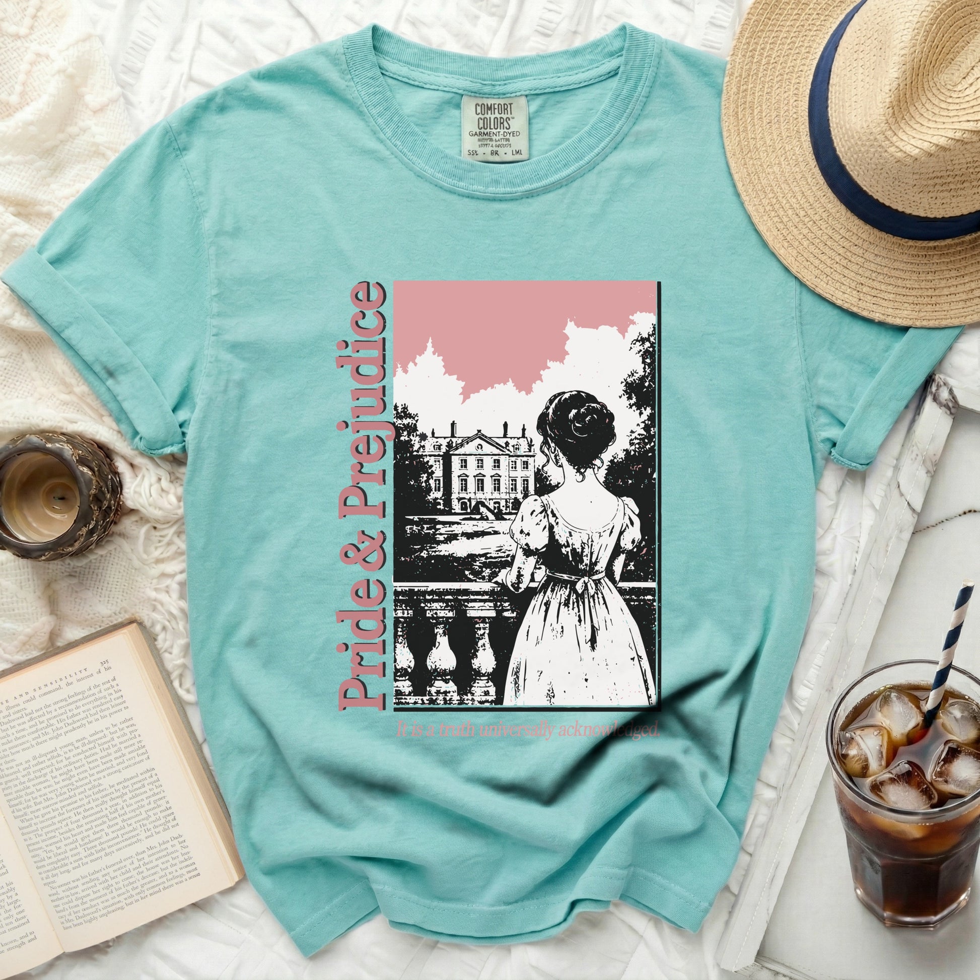 Teal Comfort Colors shirt with "Pride & Prejudice" graphic of a woman looking at a mansion.