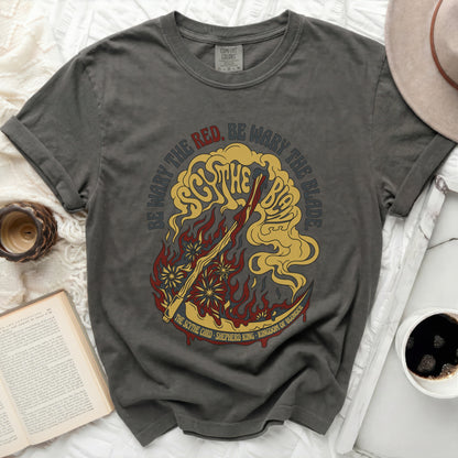 T-shirt with "Be Wary The Red. Be Wary The Blade." and scythe design.