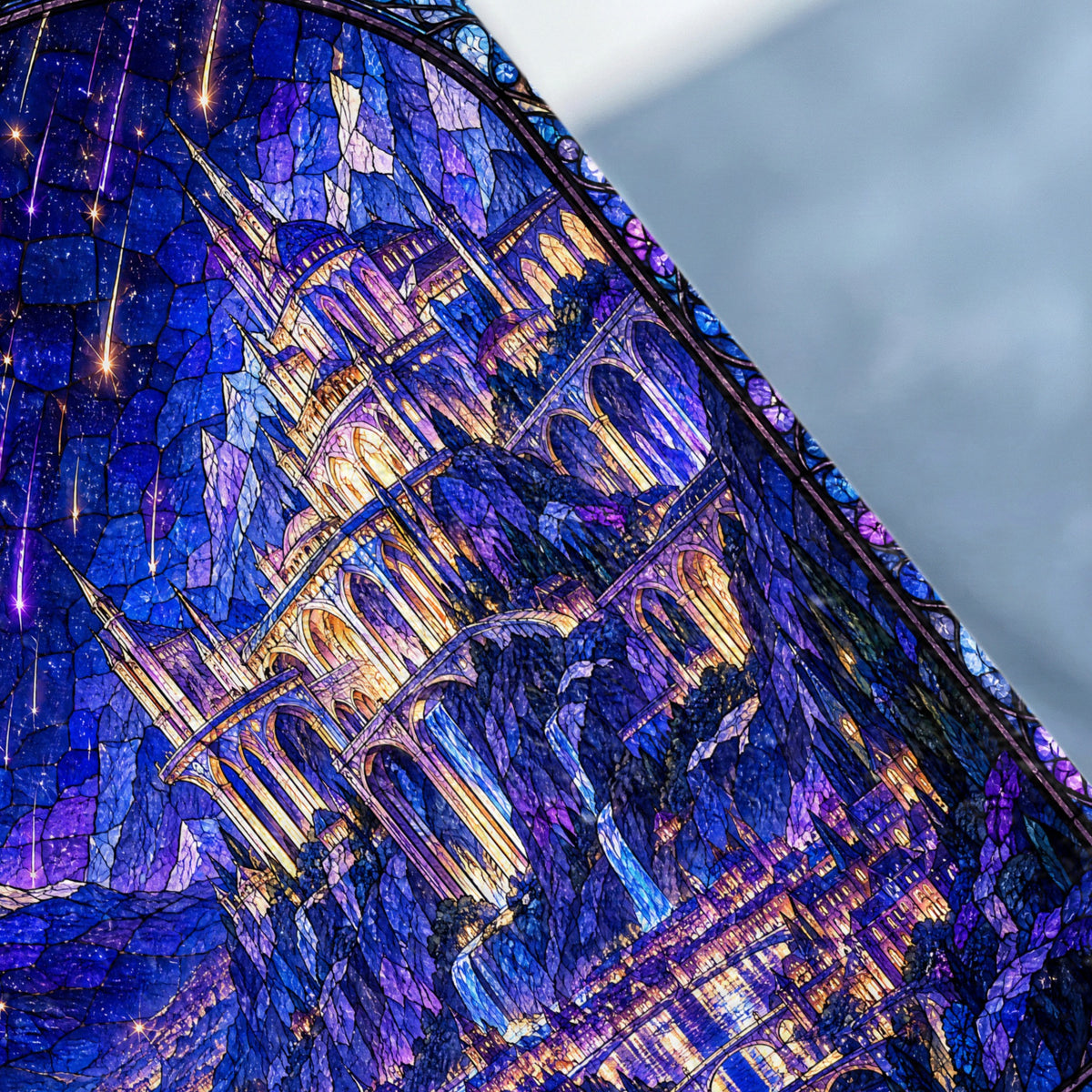 Stained glass window depicting a glowing fantasy castle under a blue night sky with falling stars.