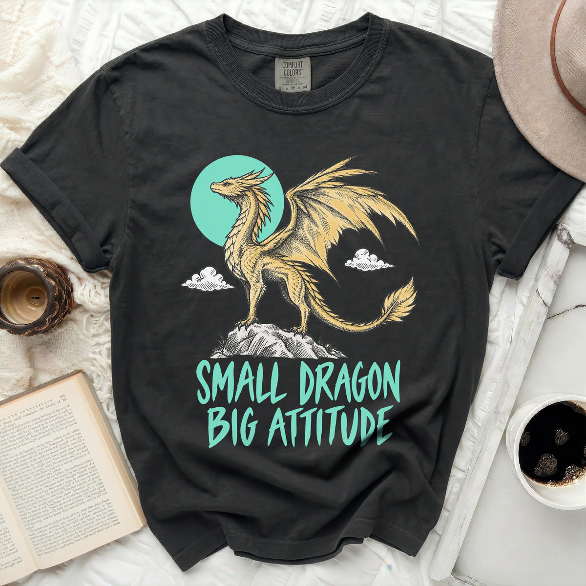 Black t-shirt with gold dragon graphic and text "SMALL DRAGON BIG ATTITUDE".