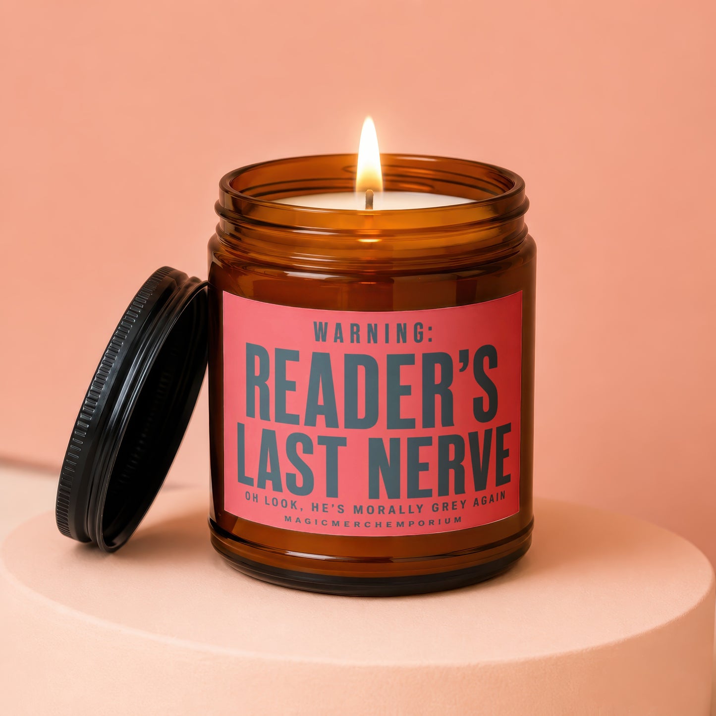 Lit candle in amber jar with red label reading "Reader's Last Nerve".