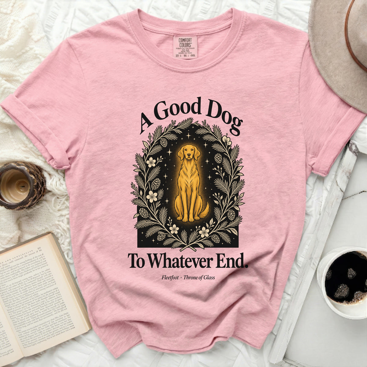 Pink t-shirt with "A Good Dog To Whatever End" text and golden dog illustration.