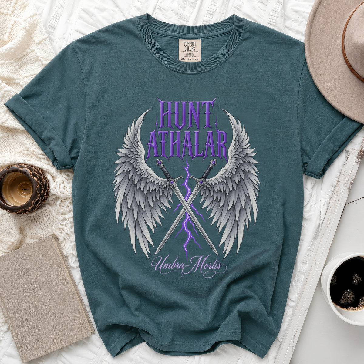 Teal t-shirt with "Hunt Athalar" text, wings, and swords design.