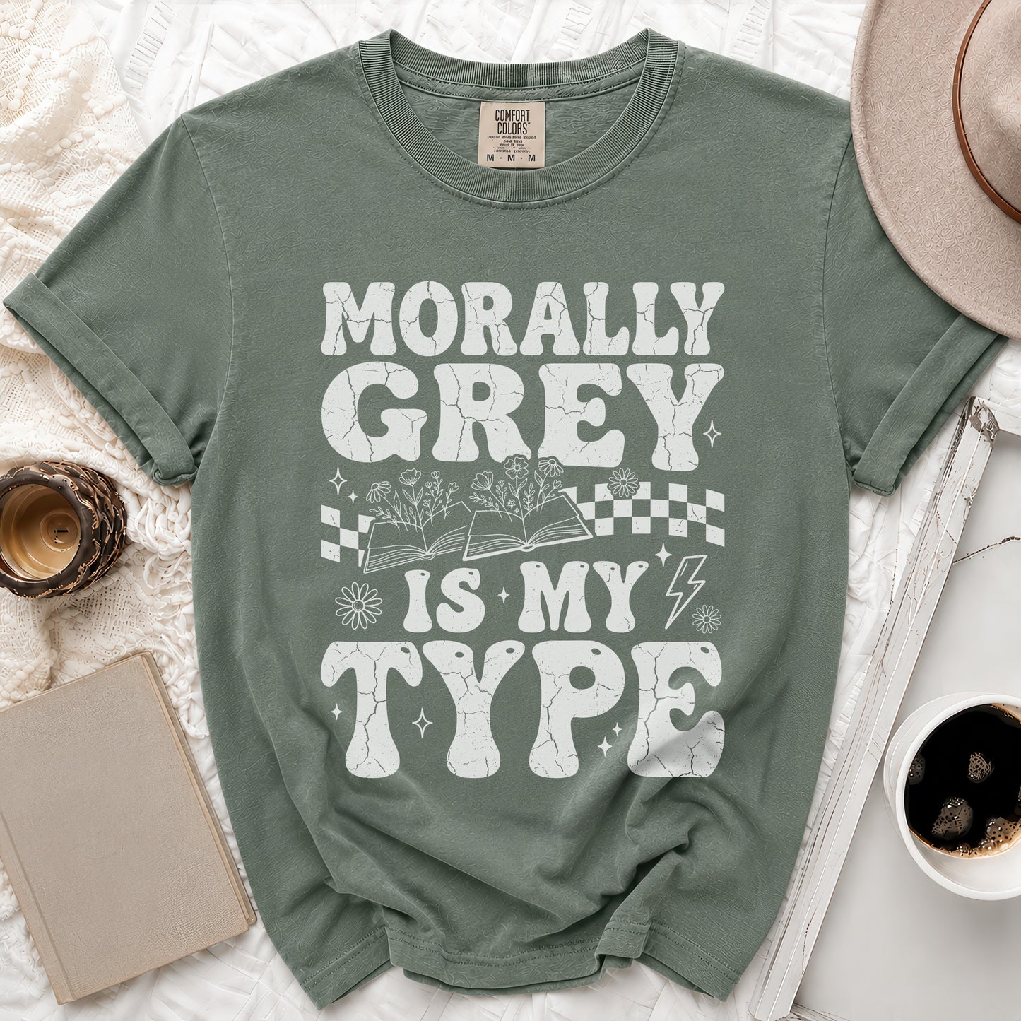 Green t-shirt with "Morally Grey Is My Type" in distressed white lettering.