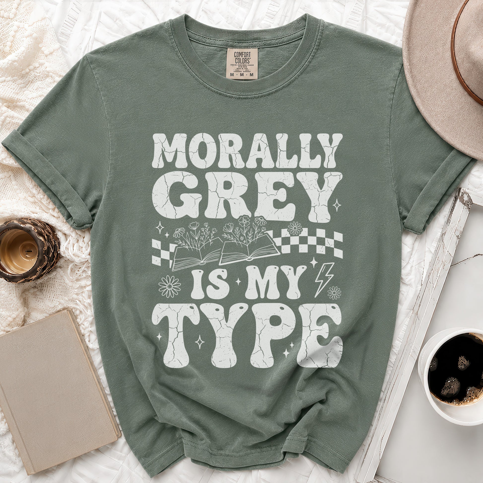 Green t-shirt with "Morally Grey Is My Type" in distressed white lettering.