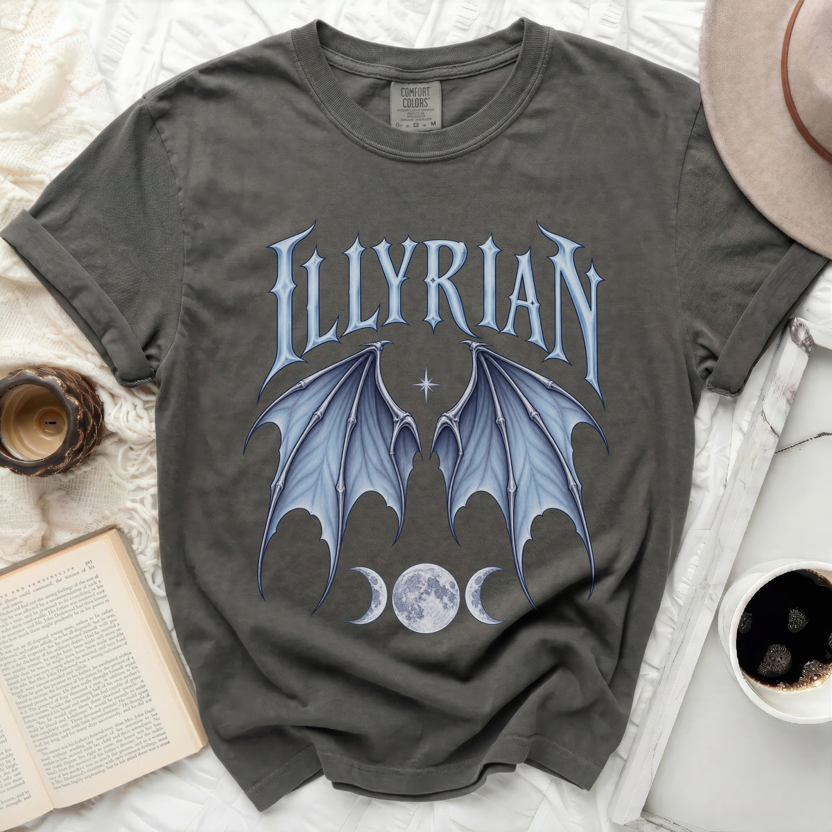 Dark gray t-shirt with "ILLYRIAN" text and blue bat wings.