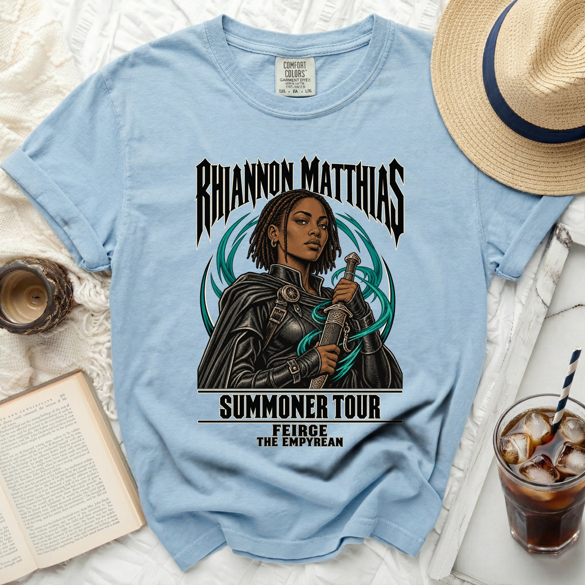 Light blue t-shirt with Rhiannon Matthias Summoner Tour graphic.