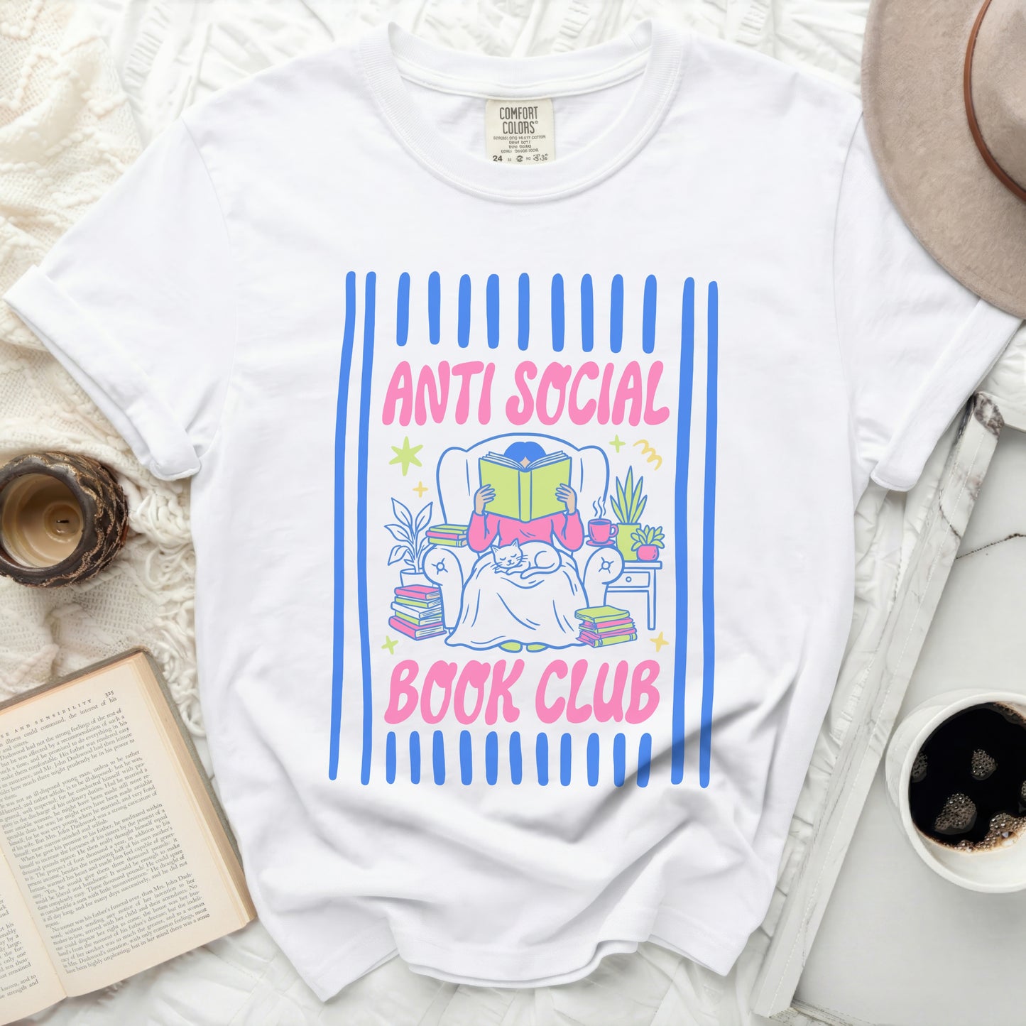 White t-shirt with "ANTI SOCIAL BOOK CLUB" text and illustration.