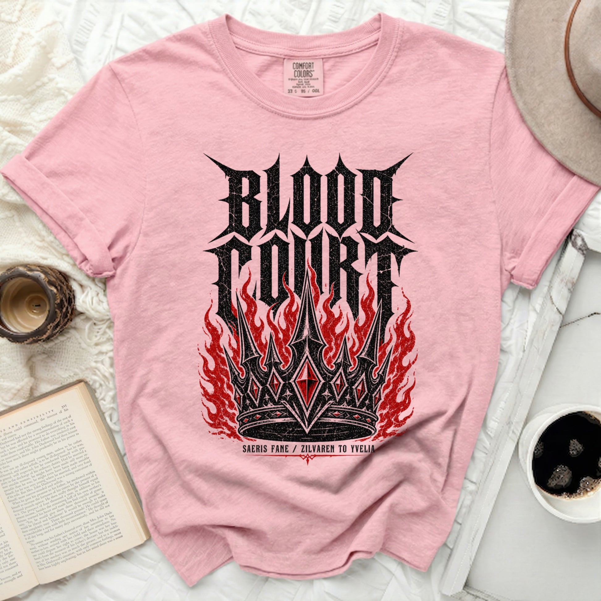 Pink t-shirt with "Blood Court" text and crown graphic with flames.