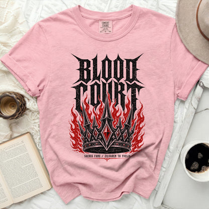 Pink t-shirt with "Blood Court" text and crown graphic with flames.
