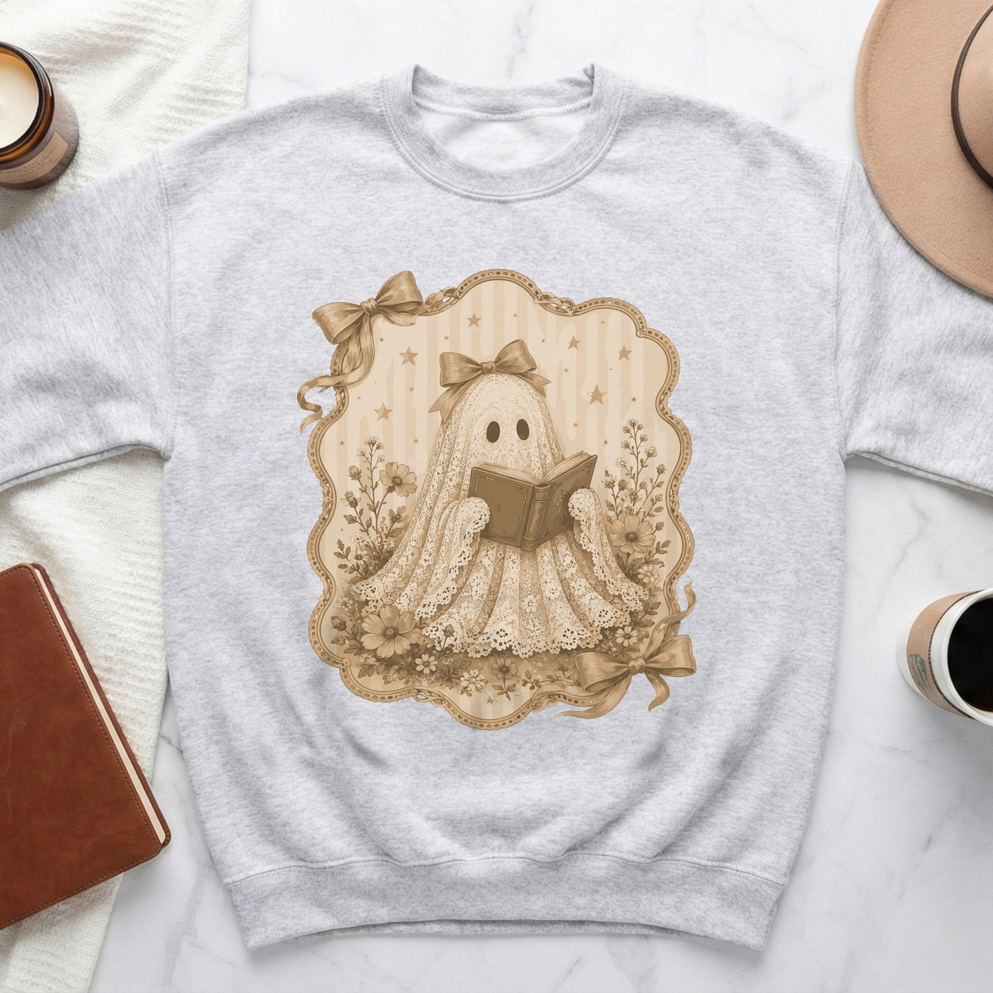 Light gray sweatshirt with a sepia-toned ghost reading a book in a decorative frame.