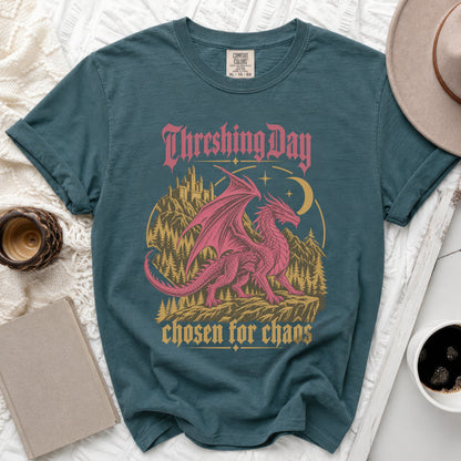 Teal t-shirt with pink dragon, castle, and text "Threshing Day chosen for chaos".