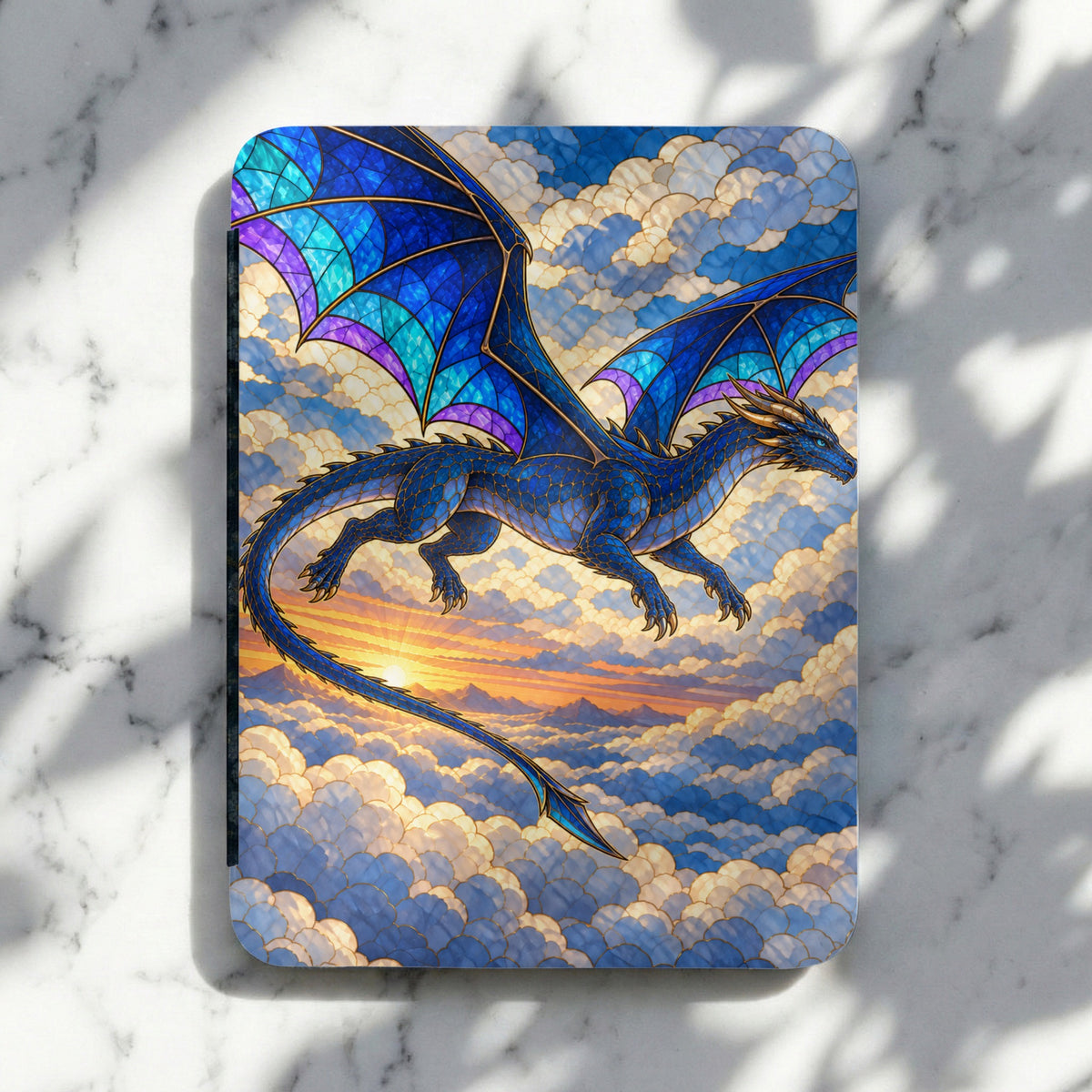 Blue dragon with stained glass wings flying through clouds at sunset.