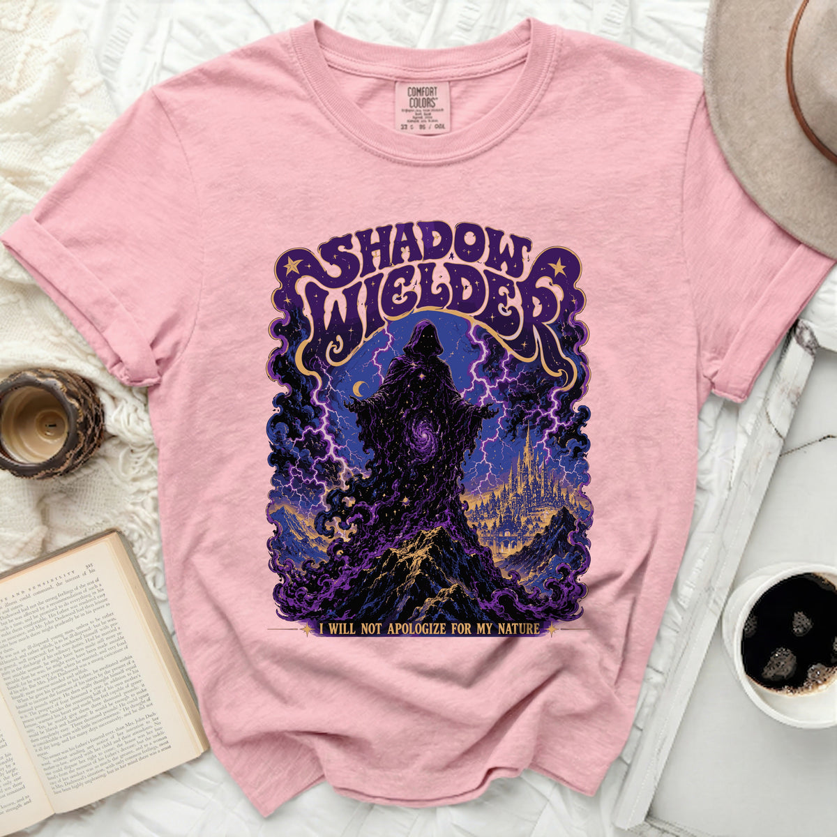 Pink t-shirt with "Shadow Welder" graphic and "I WILL NOT APOLOGIZE FOR MY NATURE" text.