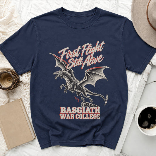 Navy t-shirt with a dragon graphic and text "First Flight Still Alive BASGIATH WAR COLLEGE".