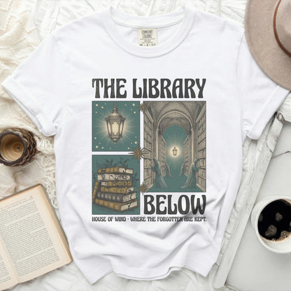 "The Library Below" text with imagery of books, a lantern, and cloaked figures.