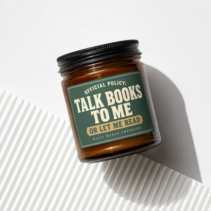 Amber jar candle with "Talk Books To Me Or Let Me Read" text.