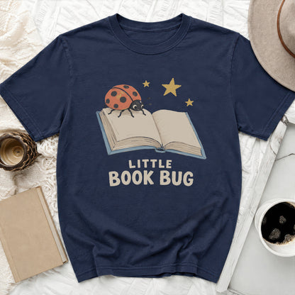 Navy t-shirt with ladybug on open book and text "LITTLE BOOK BUG".