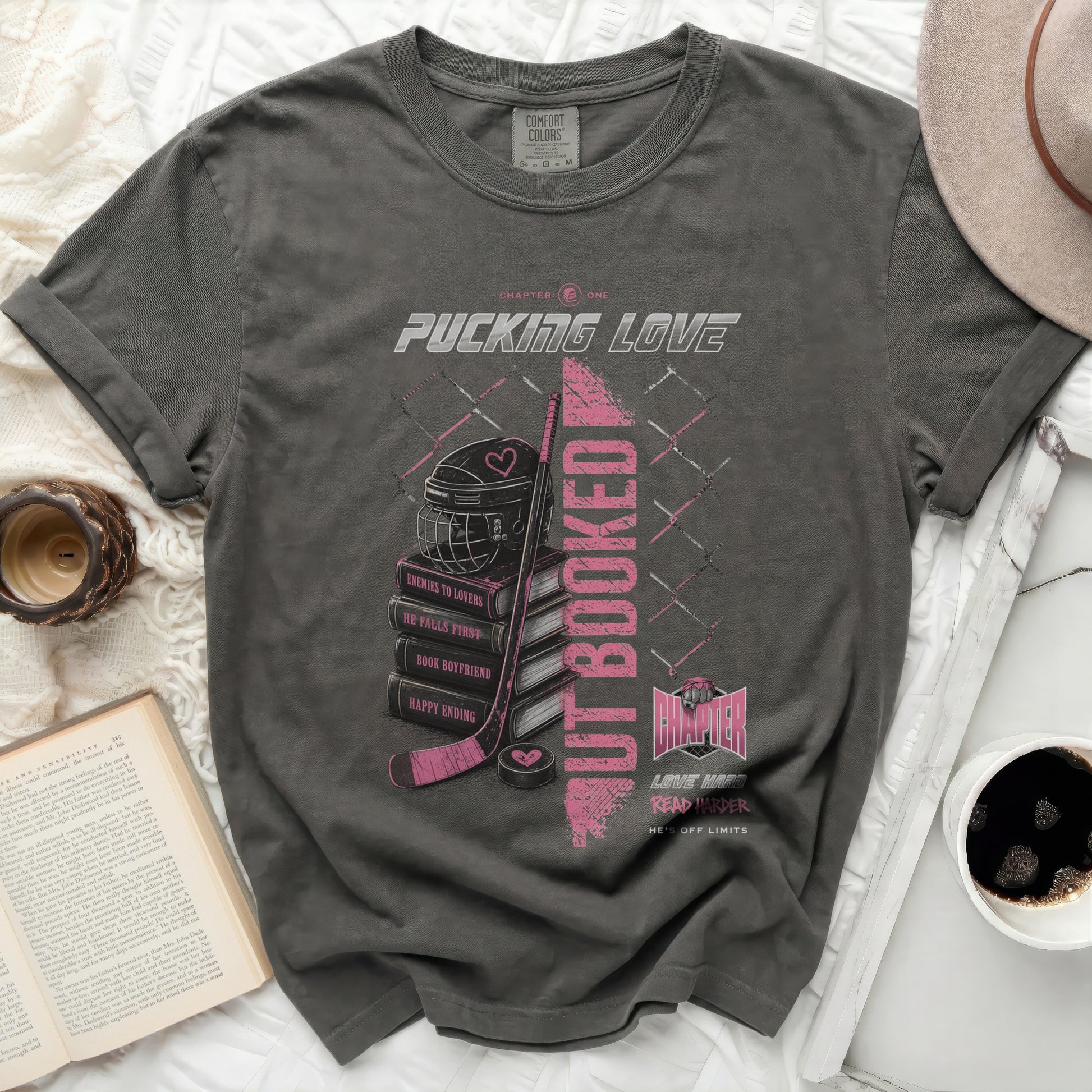 Dark grey t-shirt with "Pucking Love" text and hockey graphics.