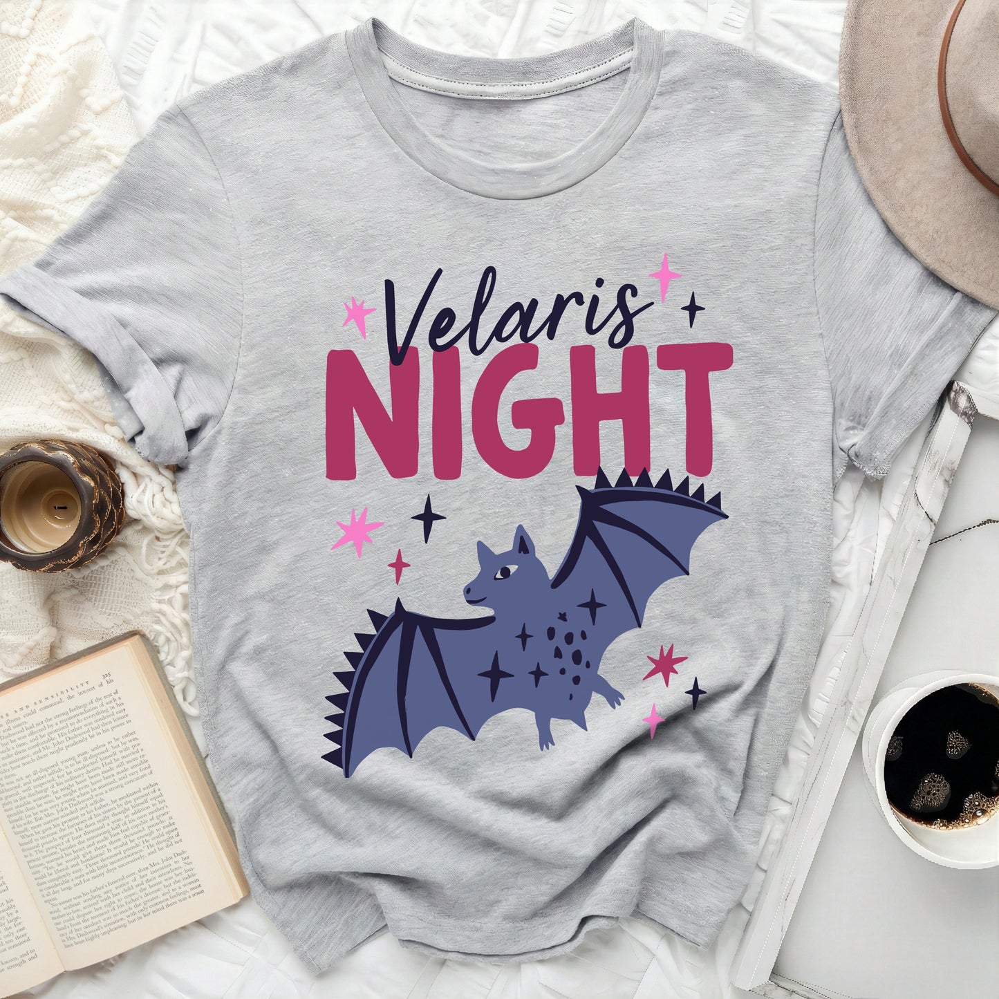 Velaris Night Bat Stars Graphic Design product type
Velaris Night Shirt
Fantasy Book Apparel
Magical Bat Design
Stars Graphic Tee
Book Lover Top
ACOTAR Inspired Shirt
Fictional City Merch
Night Sky Aesthetic
Sparkle Bat Tee
Unique Gift Idea
Trendy Fantasy Wear
Literary Fan Product
Graphic Novelty Tee
Casual Grey Shirt
Purple Bat Shirt
Pink Star Design
Cozy Reader Shirt
Dark Fantasy Style
Mythical Creature Tee
Mystical Night Wear