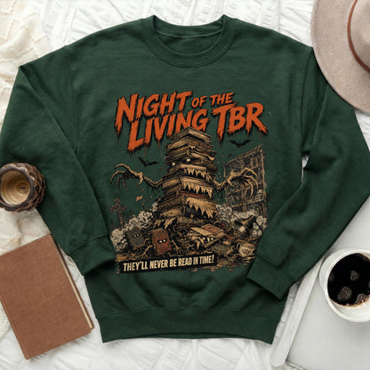 Dark green sweatshirt with "Night of the Living TBR" and a book monster.