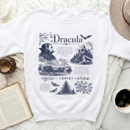White sweatshirt with blue Dracula-themed illustration and text.