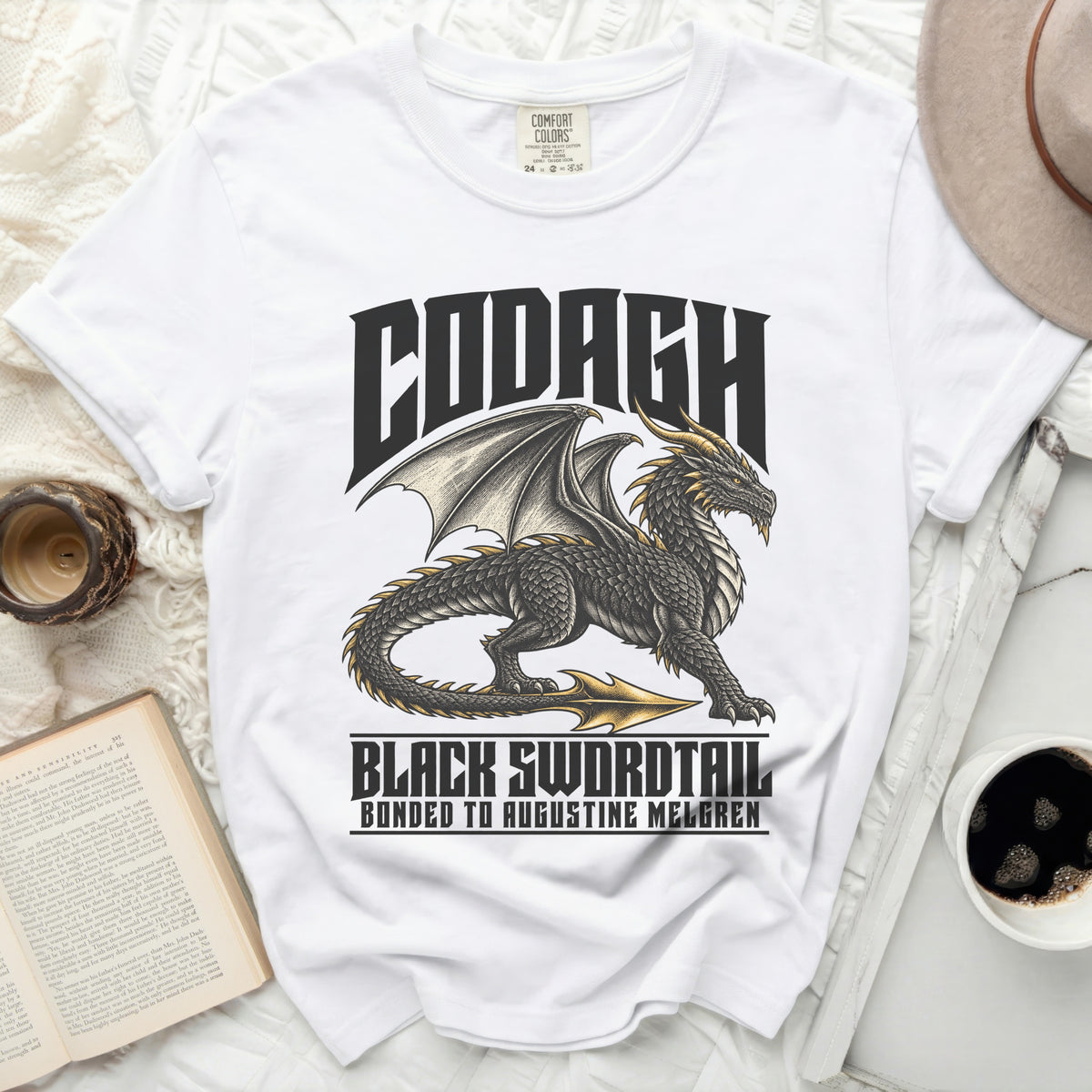 White t-shirt with black dragon graphic and text "Codagh Black Swordtail".
