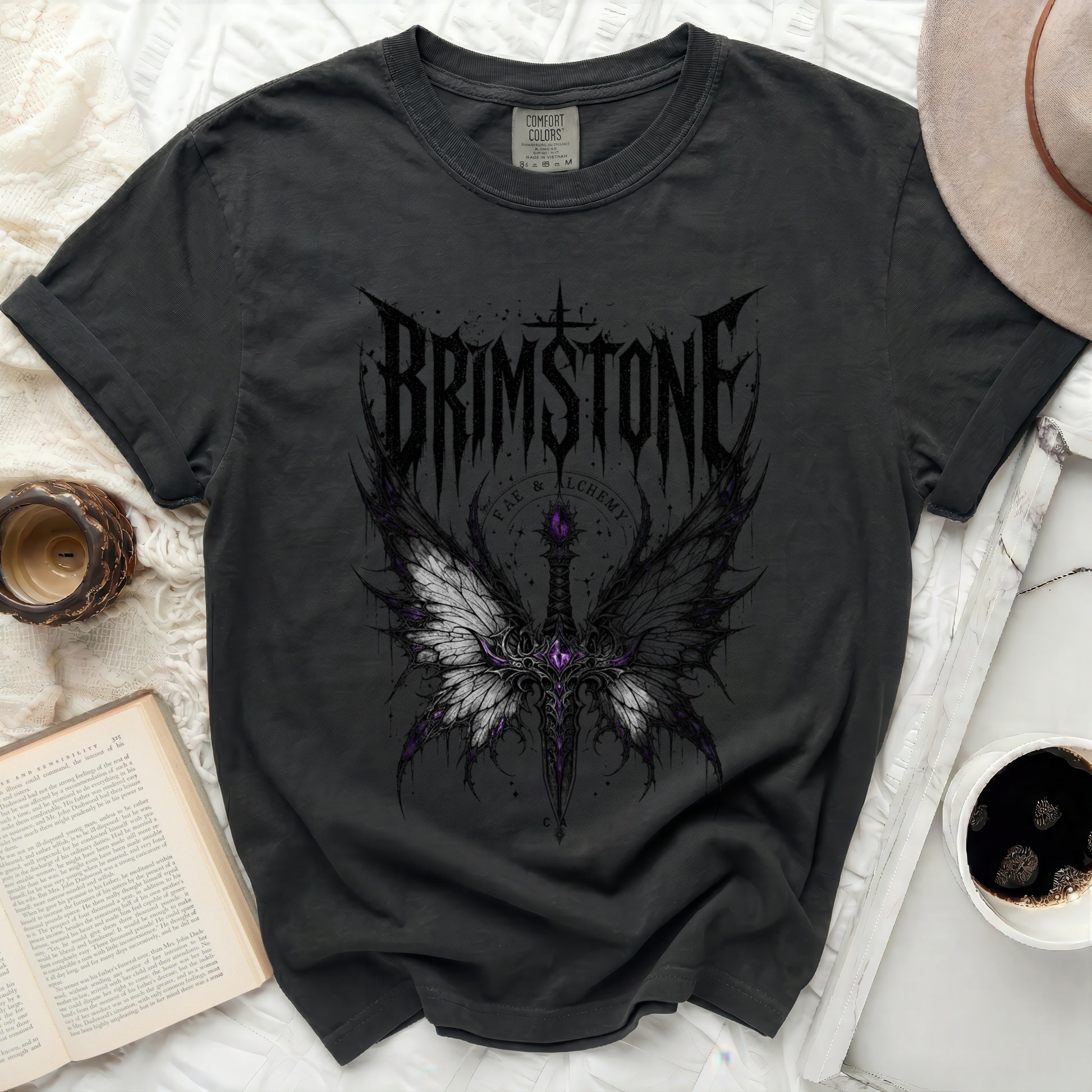Dark t-shirt with Brimstone logo featuring wings and sword.