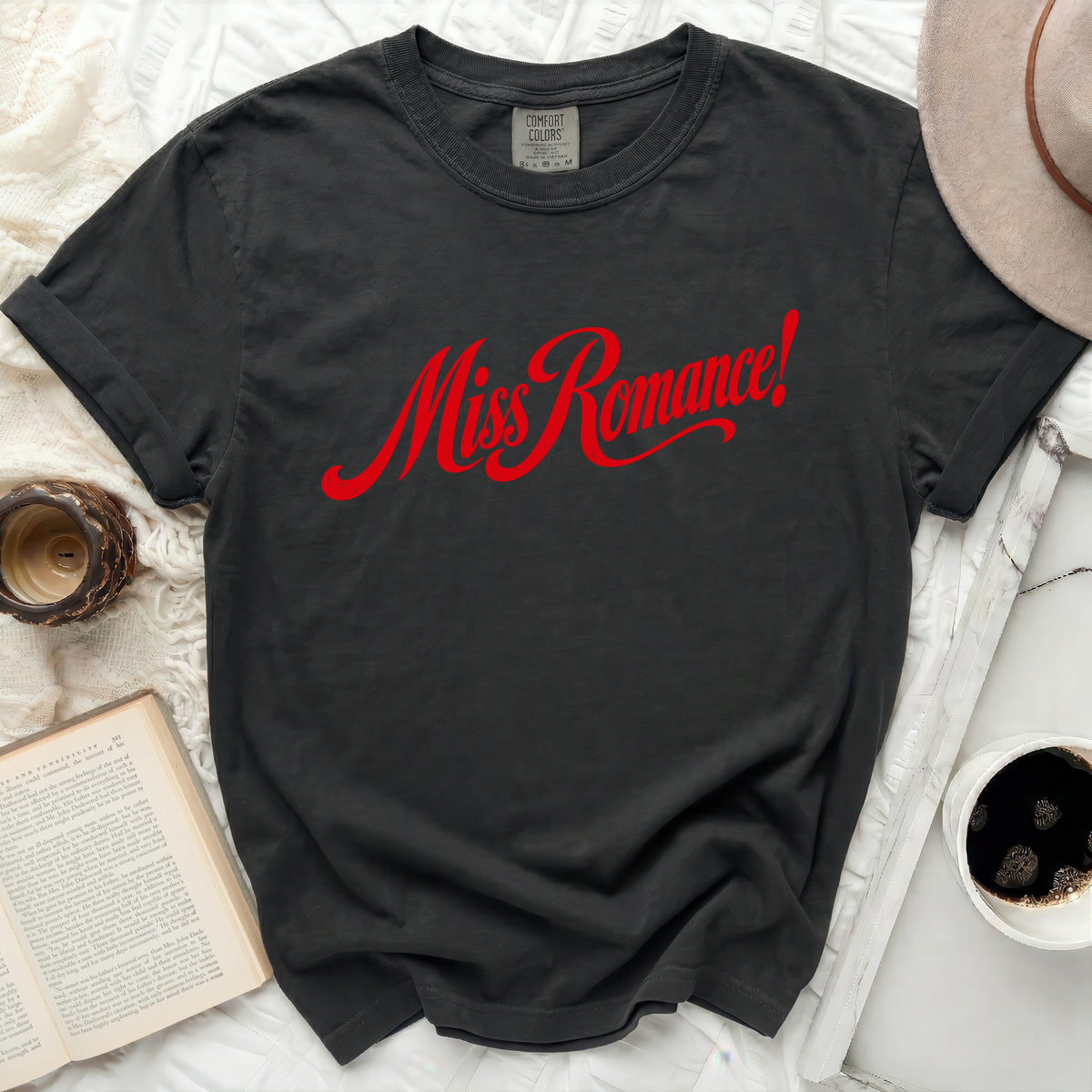 Dark grey t-shirt with red "Miss Romance!" graphic and Comfort Colors tag.
