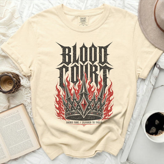 Cream t-shirt with "Blood Court" crown and flames graphic.