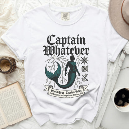 White t-shirt with "Captain Whatever" and nautical symbols.