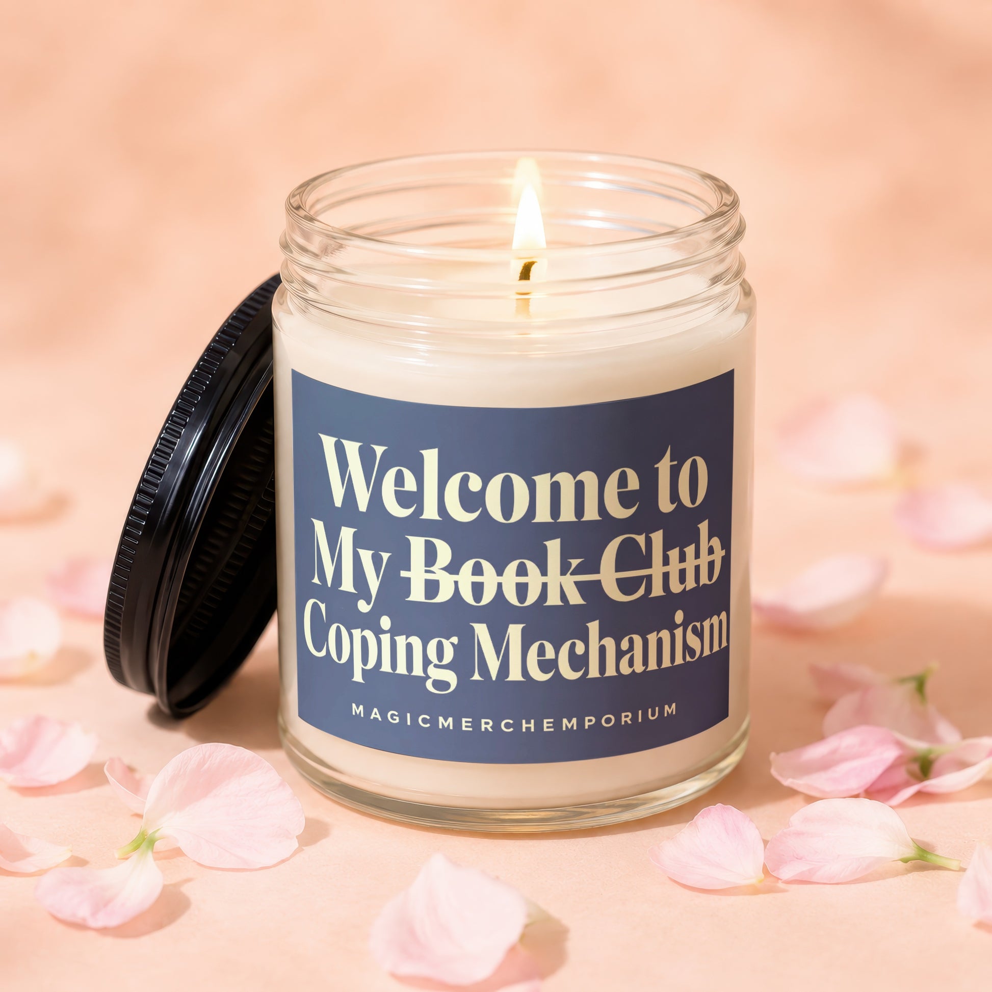 Candle with blue label reading "Welcome to My Book Club Coping Mechanism"