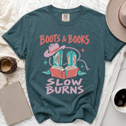 Teal t-shirt with "Boots & Books Slow Burns" and cowboy boot graphic.