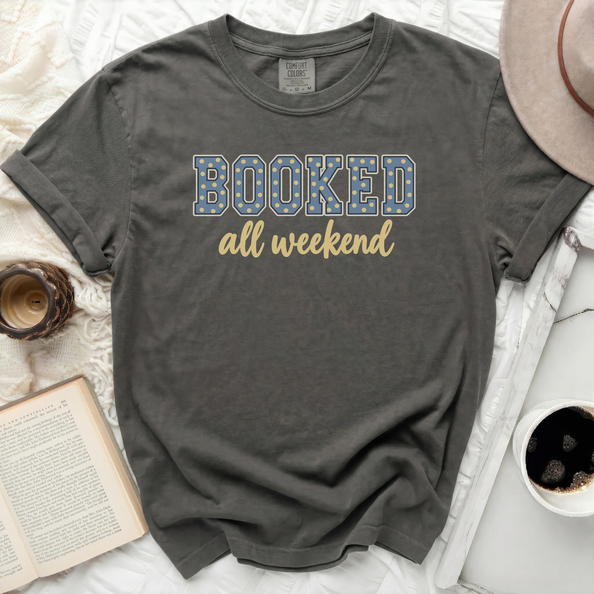 Comfort Colors gray t-shirt with "BOOKED all weekend" graphic.