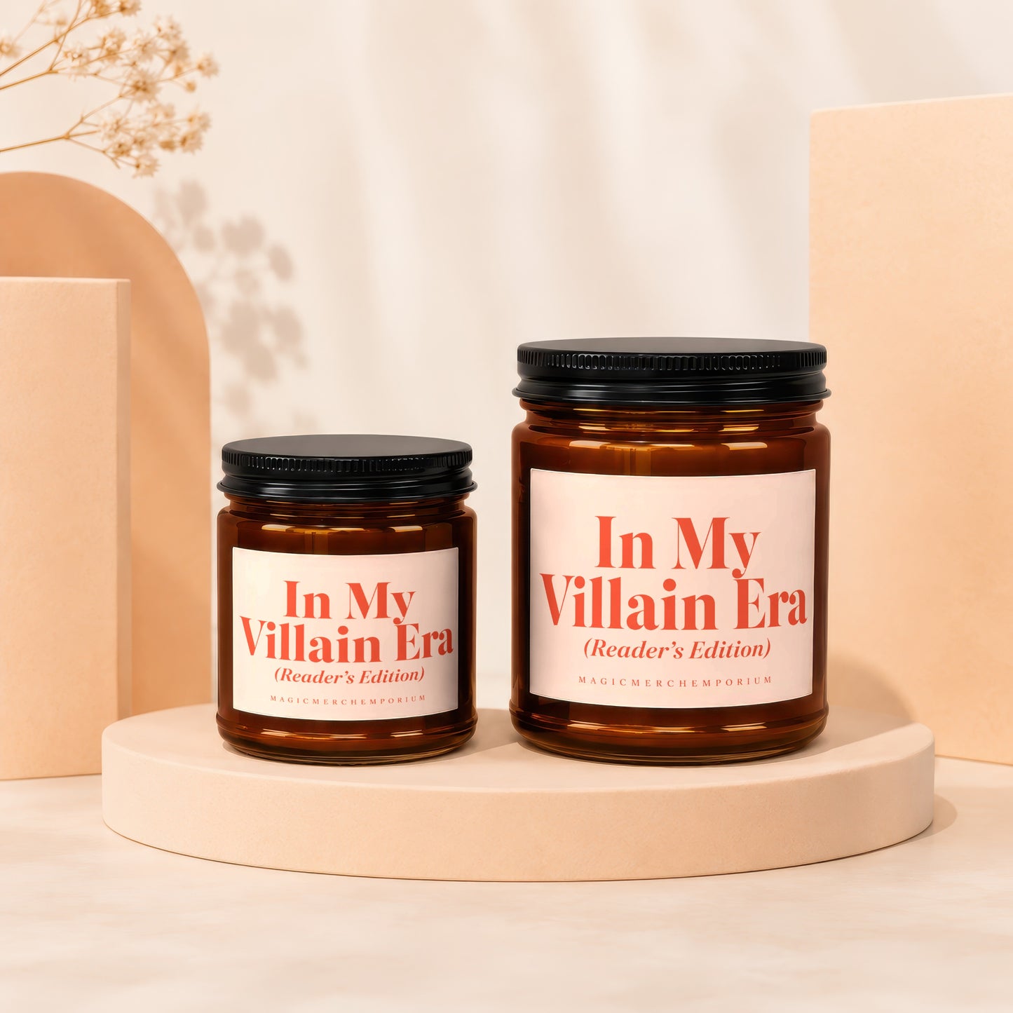 Two amber candles with "In My Villain Era (Reader's Edition)" labels.