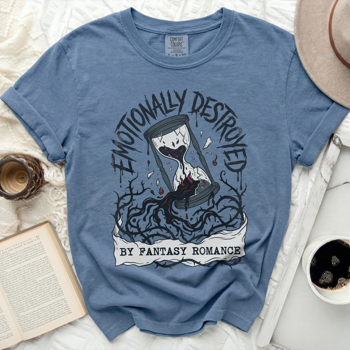 Emotionally destroyed by fantasy romance graphic on blue t-shirt.