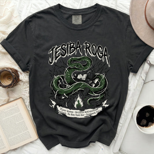 Black t-shirt with green serpent and text "JESIBA ROGA Viper Queen Griffin Antiquities"