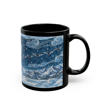 A black ceramic mug featuring a blue mosaic-style design of dragons flying over snowy mountains.