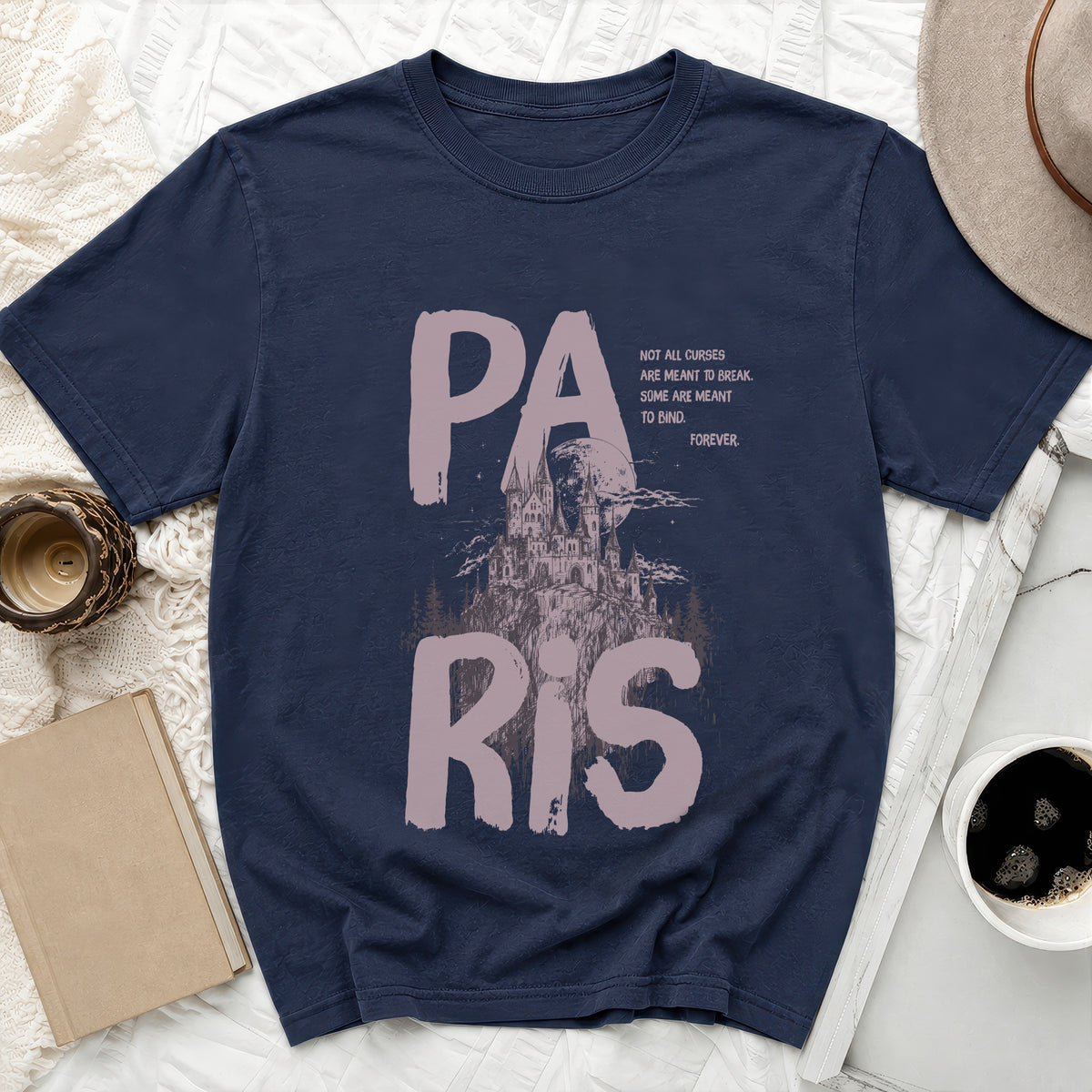 Dark navy t-shirt with "PA RIS" and castle graphic with text.
