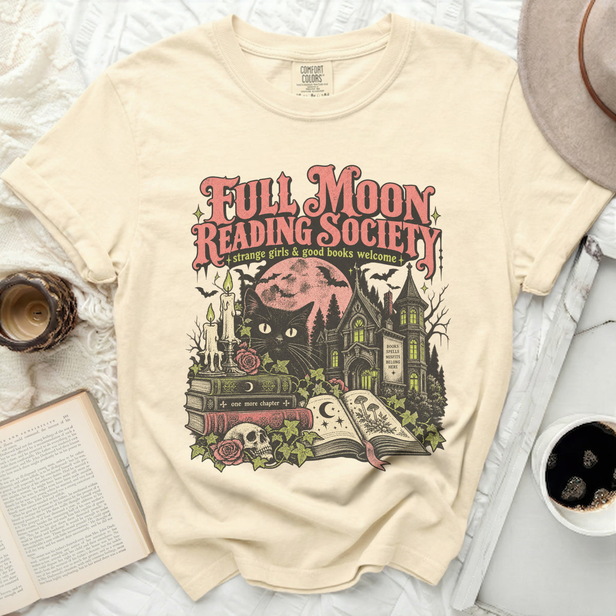 Full Moon Reading Society graphic with black cat, haunted house, books, and skull.