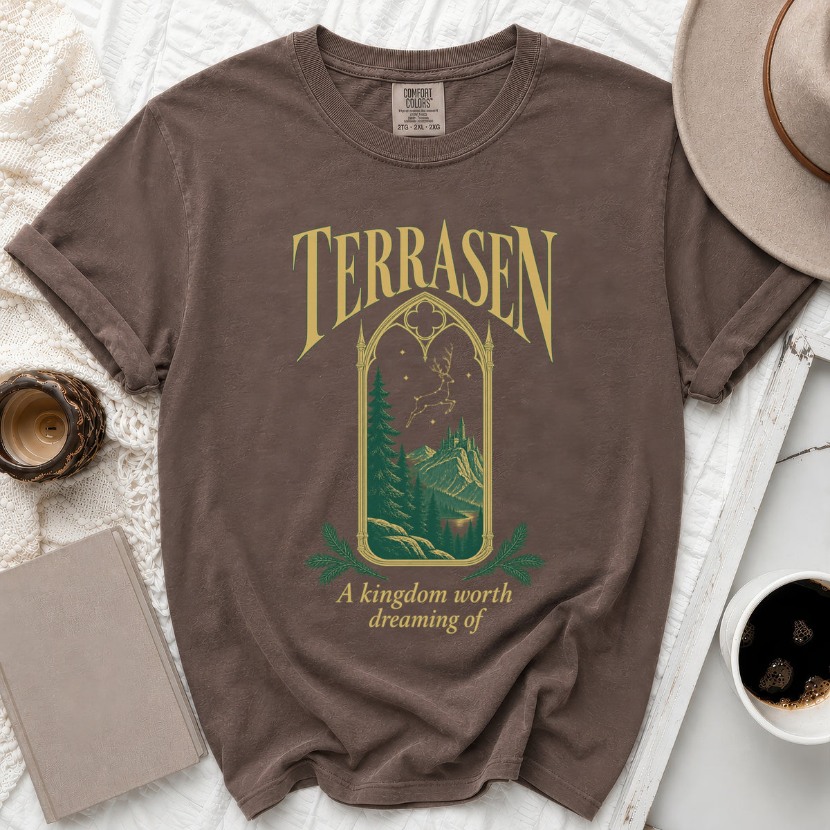 Brown t-shirt with "TERRASEN" and castle landscape graphic.