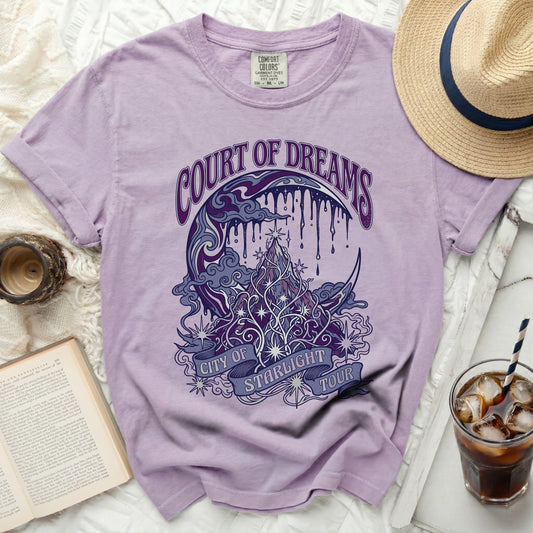 Purple t-shirt with "Court of Dreams City of Starlight Tour" graphic.