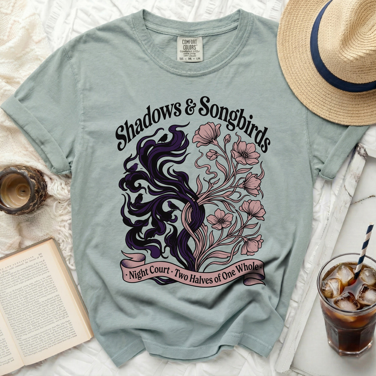 Light blue t-shirt with "Shadows & Songbirds Night Court · Two Halves of One Whole" design.