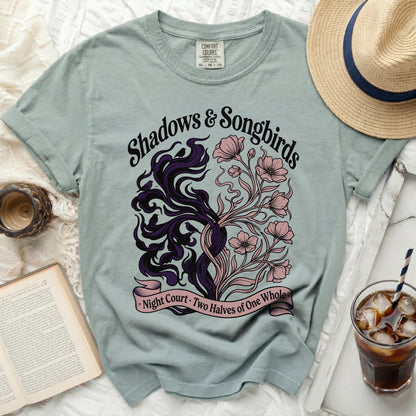 Light blue t-shirt with "Shadows & Songbirds Night Court · Two Halves of One Whole" design.