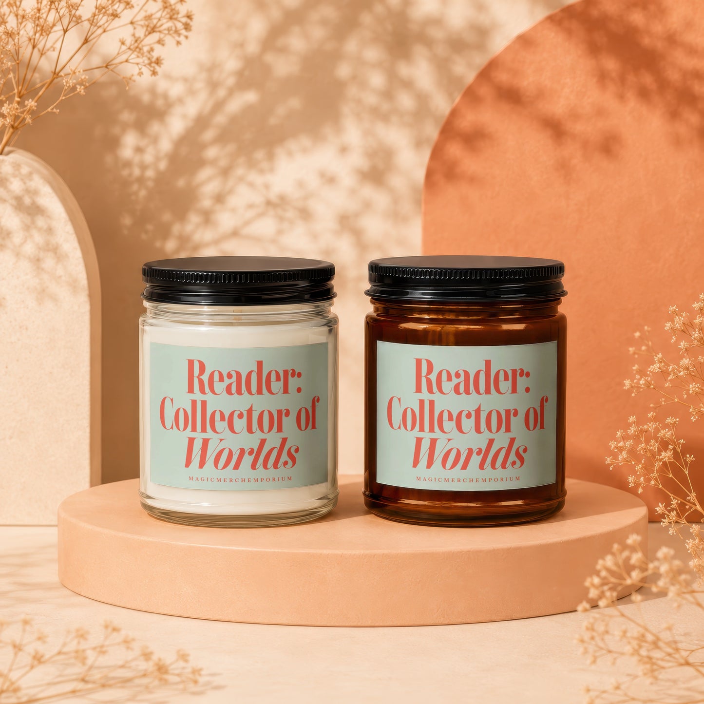 Two candles, one clear and one amber glass, with "Reader: Collector of Worlds" text.