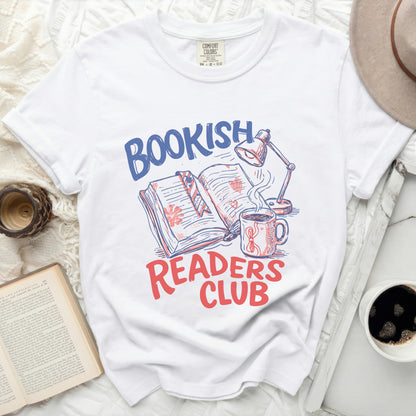 White shirt with "BOOKISH READERS CLUB" graphic, book, lamp, and coffee.