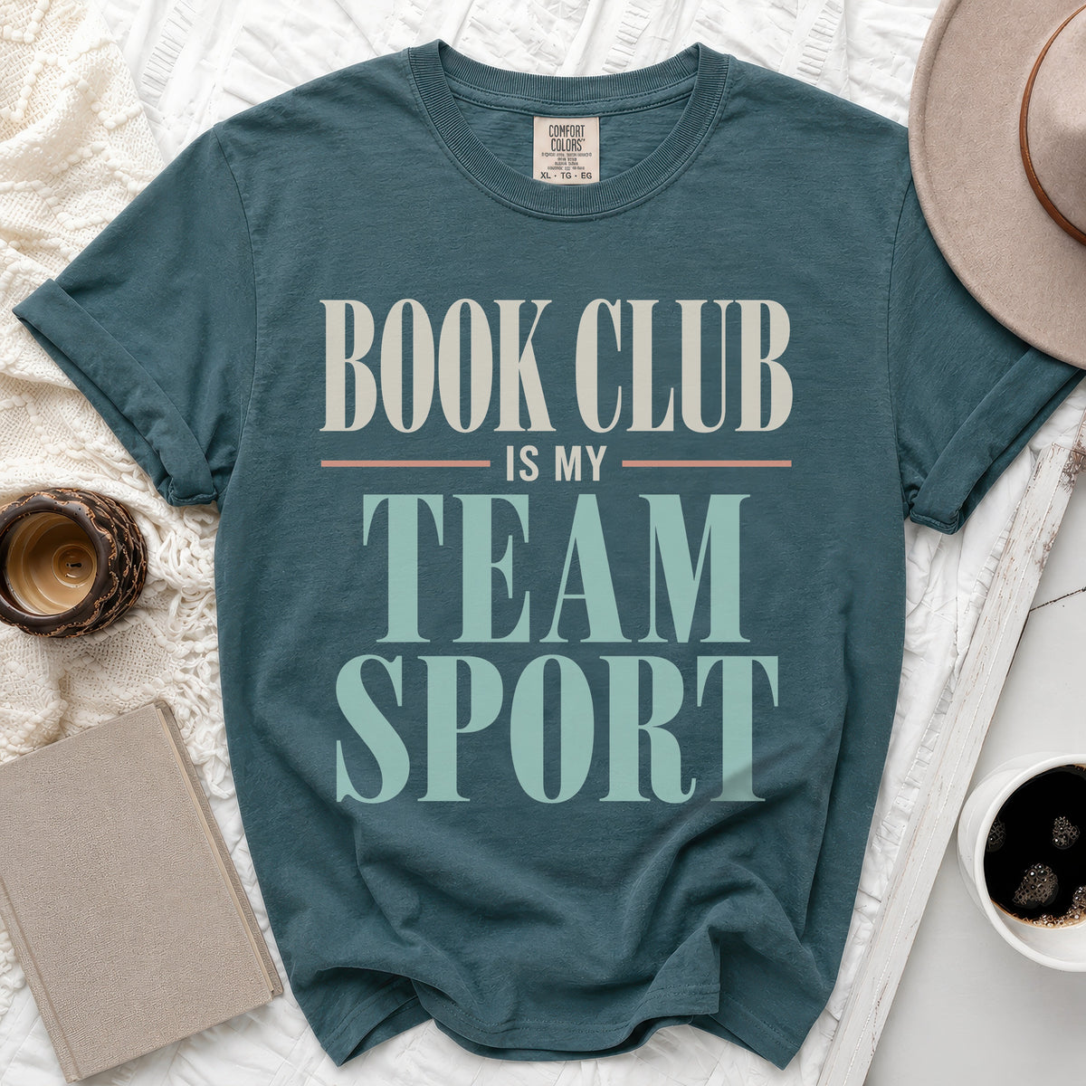 Teal t-shirt with "Book Club is my Team Sport" graphic, XL size.