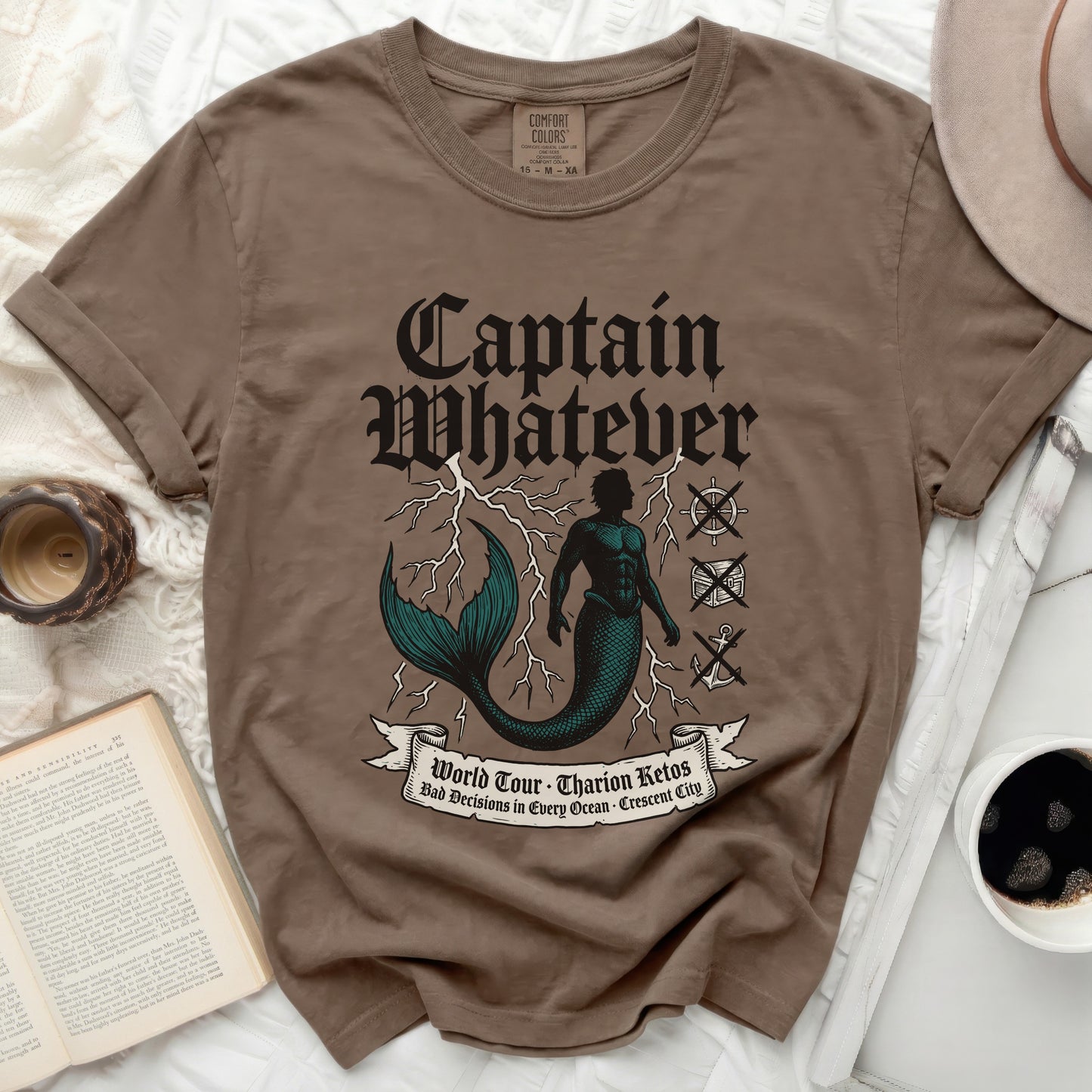 T-shirt with "Captain Whatever" and mermaid graphic, World Tour text.