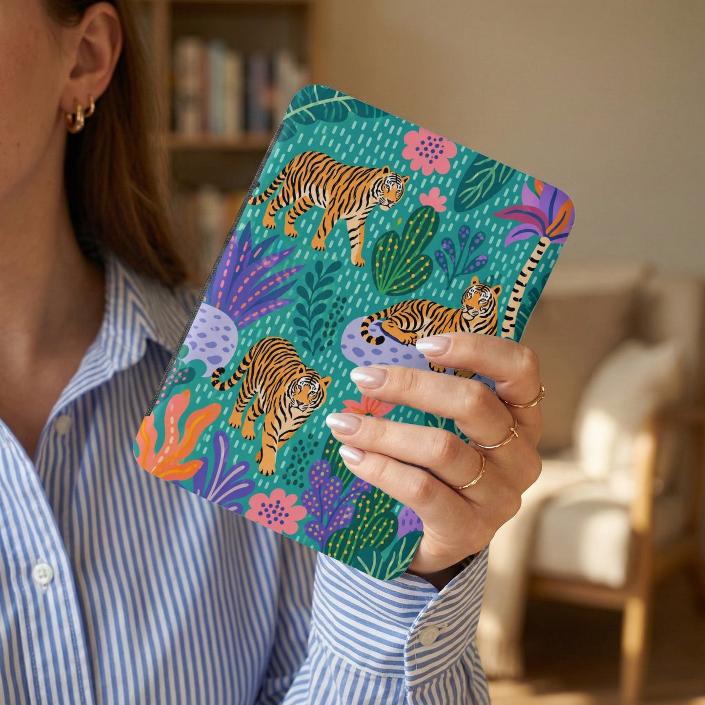 Teal accessory with three tigers and tropical floral pattern.